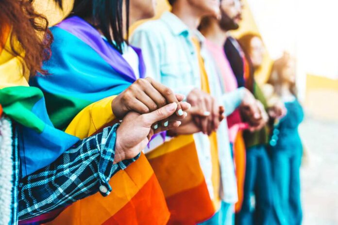 Group,Of,Lgbt,People,Holding,Hands,Outside,-,Diverse,Happy