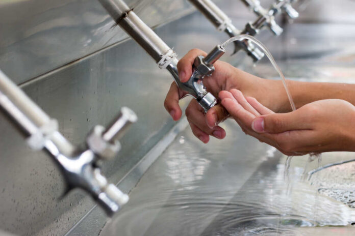 Water,Cooler,For,Drink,Use,In,School.,Water,Taps,Of