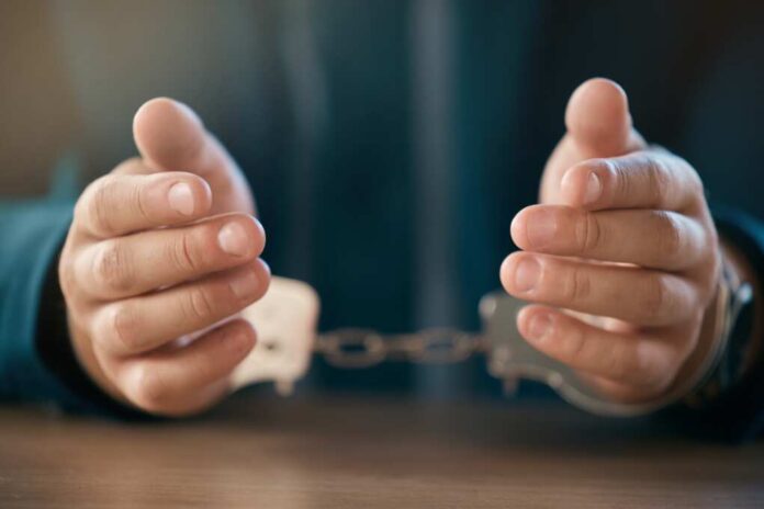 Business,Man,,Handcuffs,Hands,And,Prisoner,Lock,In,Jail,,Fraud