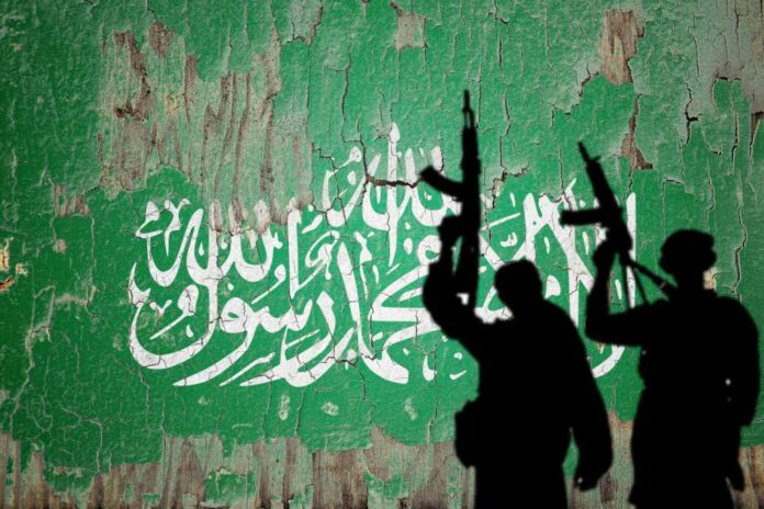 Flag,Of,Hamas,Painted,On,The,Cracked,Wall,With,Terrorist