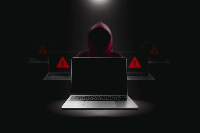 Crime,And,Attack,Technology,Concept,By,Hacker,,,Grey,Laptop