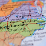Close-up of a map highlighting North Carolina and surrounding states