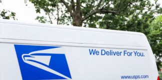 USPS delivery van with the slogan We Deliver For You.