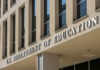 Exterior view of the U.S. Department of Education building with prominent signage