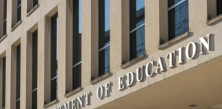 Exterior view of the U.S. Department of Education building with prominent signage