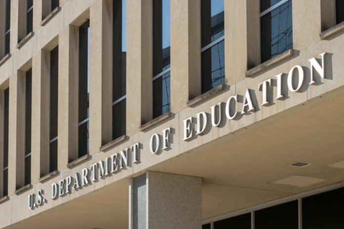 Exterior view of the U.S. Department of Education building with prominent signage