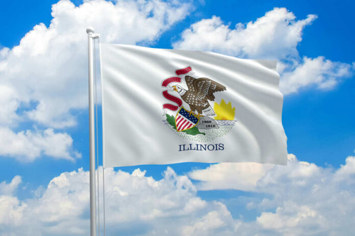 Illinois state flag waving against a blue sky with clouds