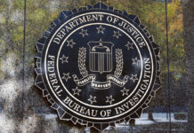 FBI seal displayed on a building exterior