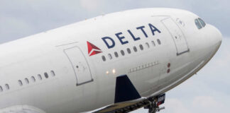 Close-up of a Delta Airlines airplane during takeoff