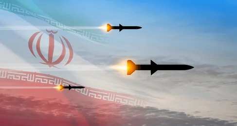 shutterstock_22383307653.jpg Missiles launching against a backdrop of the Iranian flag