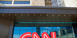 Exterior view of the CNN headquarters with a large red logo