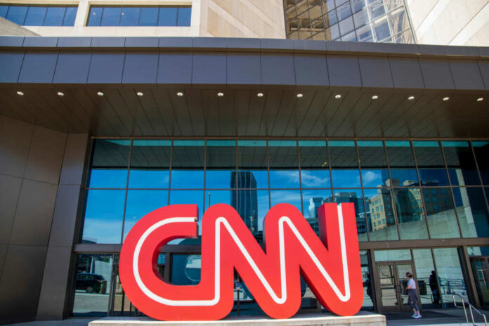 Exterior view of the CNN headquarters with a large red logo