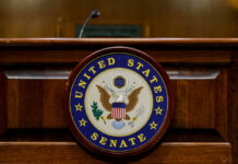 Fifth FAILED Vote: DHS Funding Deadlock Continues Close-up of the United States Senate seal on a wooden podium