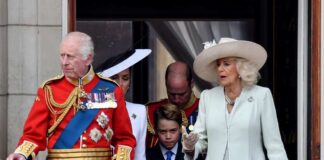 Members of the royal family gathered on a balcony at Buckingham Palace