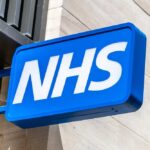 NHS sign displayed prominently on a building