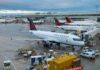 NTSB Uncovers Deep Airport Safety Risks Air Canada planes parked at an airport terminal with ground crew working