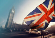 British flag waving in front of Big Ben in London