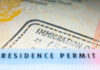 Close-up of a residence permit showing immigration details