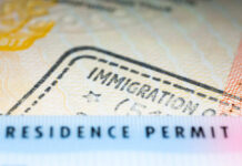 Close-up of a residence permit showing immigration details