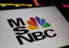 Close-up of the MSNBC logo featuring a colorful peacock design