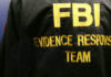 Savannah Guthrie Pleads: Help Find Mom Close-up of an FBI Evidence Response Team jacket with gold lettering