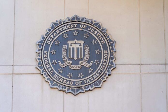 FBI seal mounted on a wall, representing the Federal Bureau of Investigation
