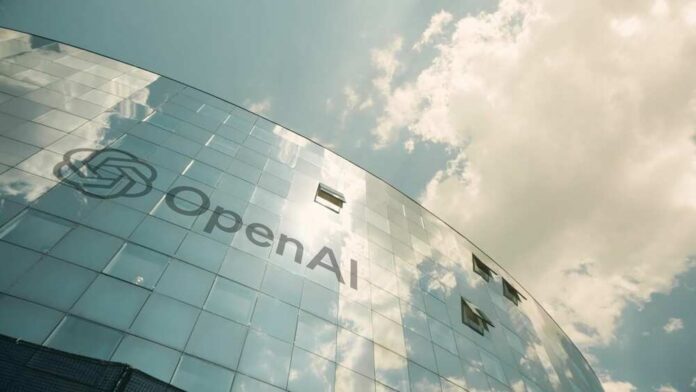 A modern glass building with the OpenAI logo against a cloudy sky