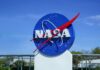 NASA logo displayed against a clear blue sky
