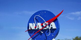 NASA logo displayed against a clear blue sky