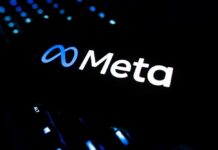 Illuminated Meta logo against a dark background