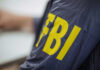 ISIS-Inspired Plot Foiled: Brooklyn Jews Targeted Close-up of an FBI agents jacket with yellow lettering