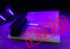 Pandemic Heist Unveiled: $22.2B Fraud Shock A passport under UV light with a stamp indicating fraud