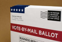 500,000 Ballots Recalled: Maryland’s Shocking Error Vote-by-mail ballot with election details and postage information