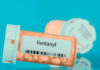 Prescription bottle labeled Fentanyl with pills inside
