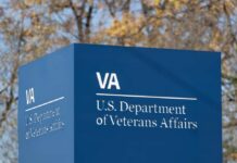 Veteran Suicides Outnumber War Deaths Sign for the U.S. Department of Veterans Affairs