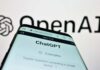 AI CLONES Stealing Identities—Are You Next? Close-up of a smartphone displaying the ChatGPT interface with the OpenAI logo in the background