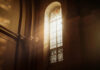 Church in FLAMES: Heartbreaking Attack by Jihadists Sunlight streaming through a stained glass window in a church