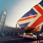 Violent Rhetoric Ignites Police Panic in UK British flag waving in front of Big Ben in London