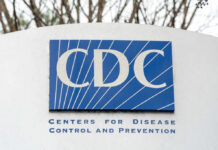 Six Feet Myth? CDC Can’t Show Receipts Sign displaying the CDC logo and full name, Centers for Disease Control and Prevention