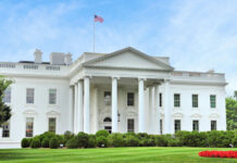 FBI Sting Or Hype? White House UFC Plot The White House with an American flag flying above, surrounded by greenery