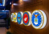 Leaked War Chats Rattle Pentagon Display of military seals representing various branches of the U.S. Department of Defense