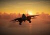 Hormuz Tension Spikes After Apache Splashdown Military aircraft flying against a sunset backdrop