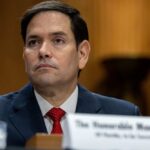 Rubio-Lieu Meltdown Over ‘Sleepy Trump’ A government official sitting at a hearing with a serious expression