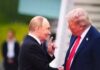 G7 Showdown: Trump Presses Putin Two political leaders shaking hands during a meeting