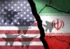 Kharg Island: Quick Win Or Quagmire? A cracked wall featuring the flags of the USA and Iran with military aircraft silhouettes