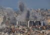 Diplomacy on Edge: Trump Torches Beirut Strike Smoke rising from buildings in a densely populated urban area