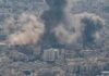 Ceasefire ‘Over’ — Legal Limbo Explodes Smoke plumes rise over a dense cityscape