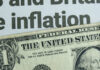 Trump’s ‘Defeated’ Inflation Claim Collides With BLS Close-up of a US dollar bill with a newspaper headline about inflation