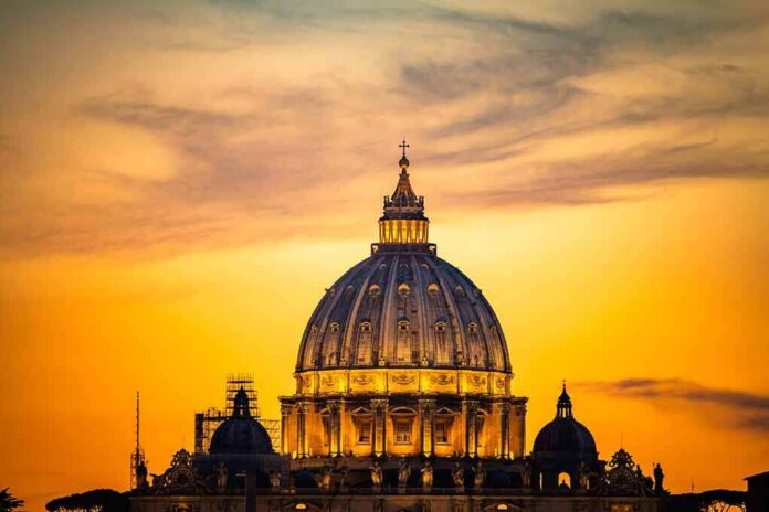 shutterstock_1175584342 St. Peter's Basilica dome at sunset