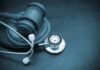 Tylenol Turmoil: Judges Weigh Stunning Comeback A wooden gavel next to a stethoscope on a dark surface